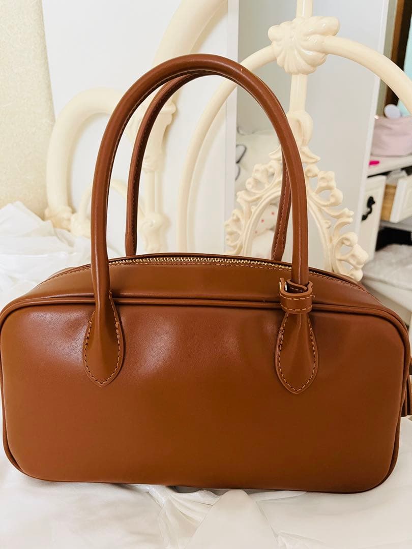 スナイデルエンボスロゴバッグブラウン美品