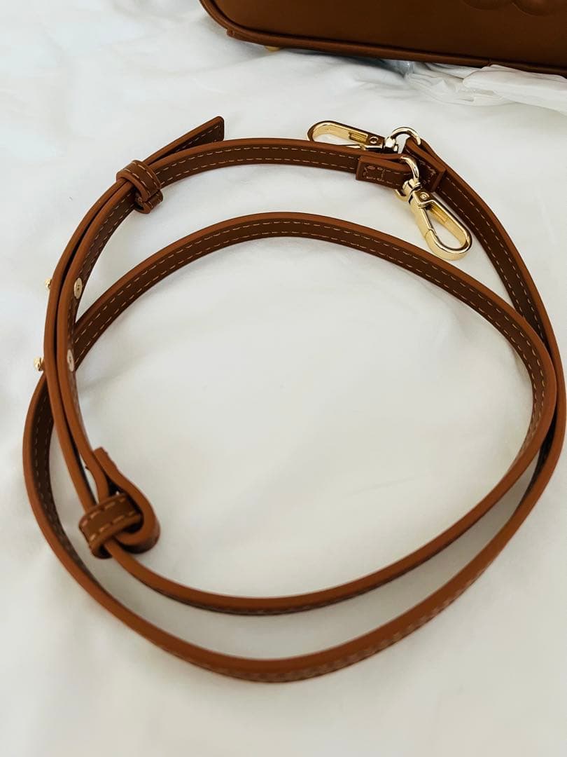 スナイデルエンボスロゴバッグブラウン美品
