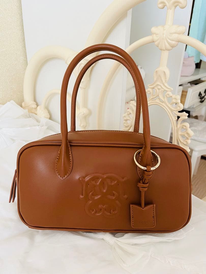 スナイデルエンボスロゴバッグブラウン美品