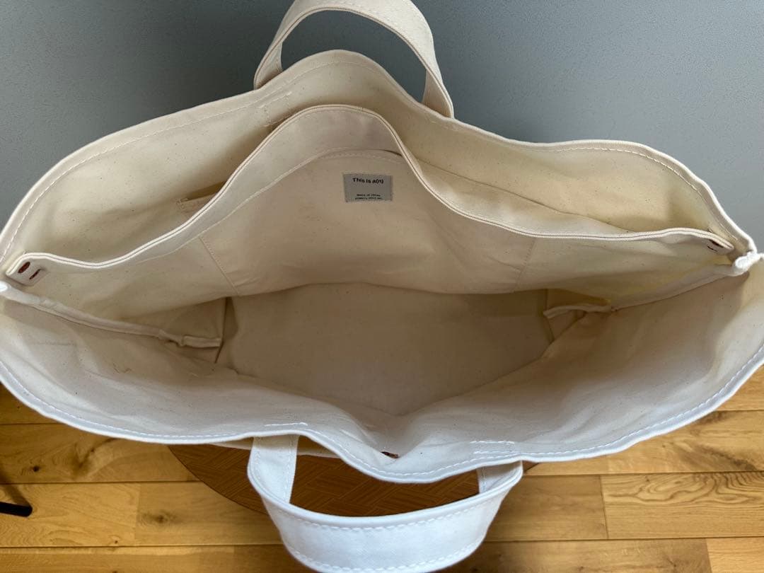 This is a(n) base tote l トートバッグ Lサイズ