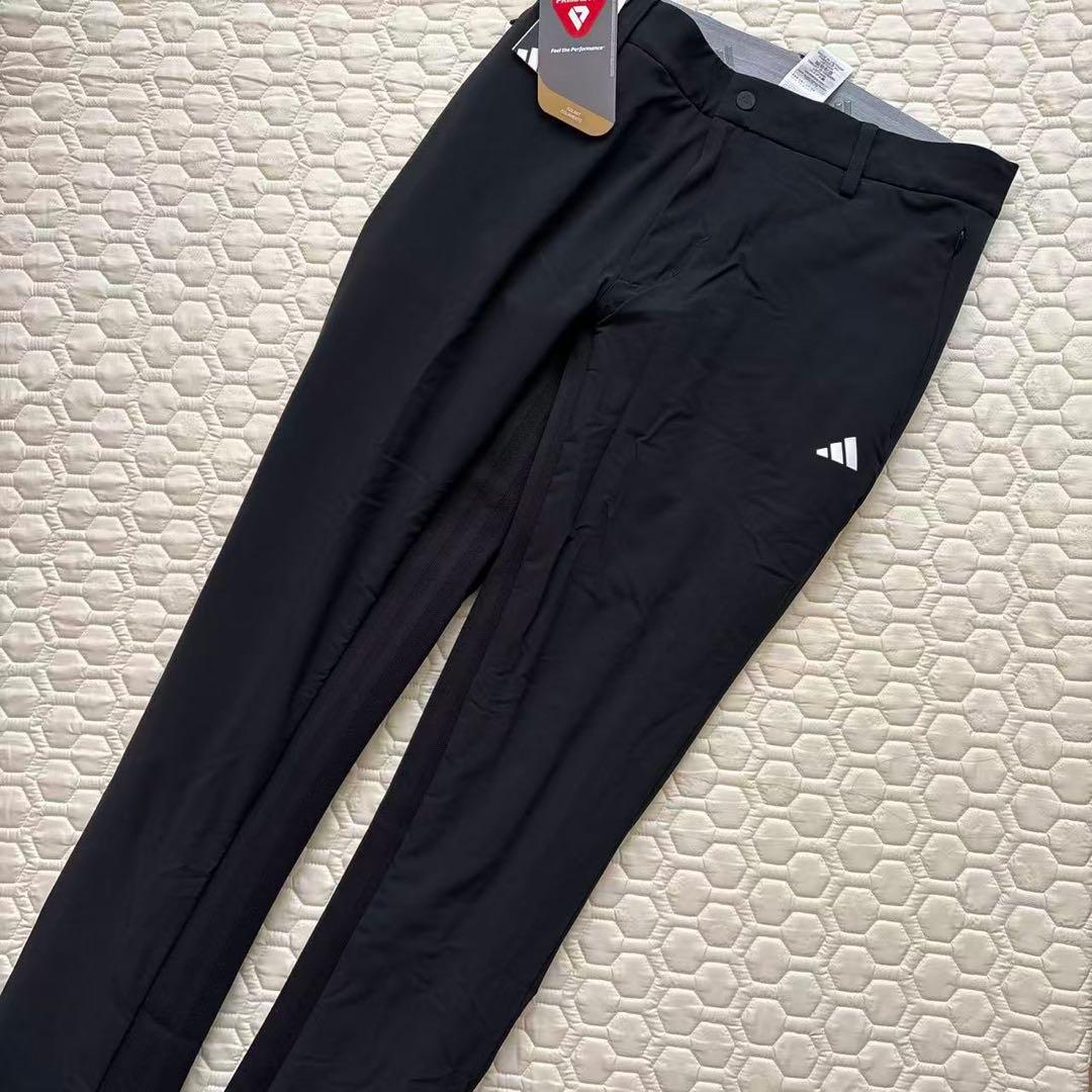 79cm新品27500円アディダスゴルフ/メンズ/秋冬/中綿ストレッチパンツ/黒