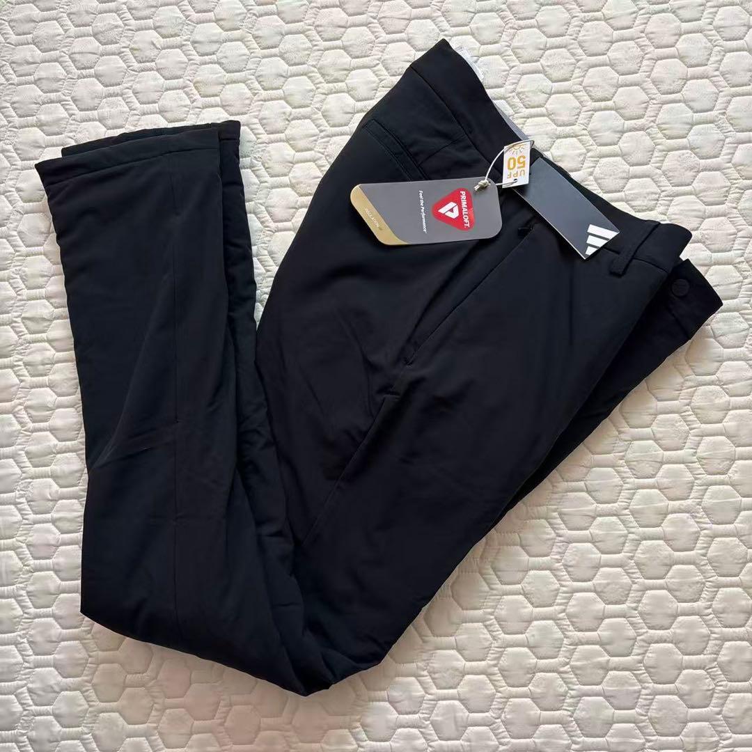 79cm新品27500円アディダスゴルフ/メンズ/秋冬/中綿ストレッチパンツ/黒