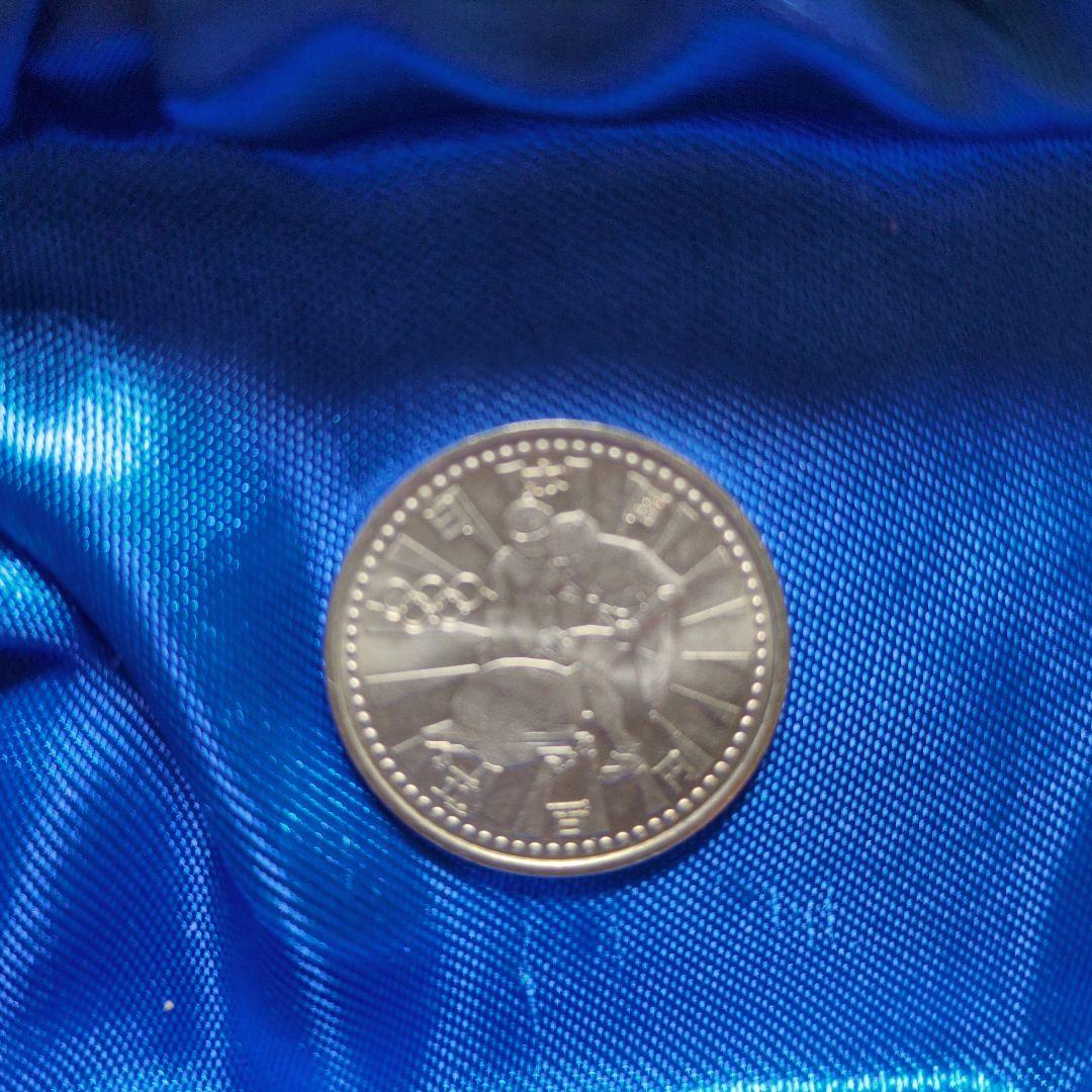 1998年長野オリンピック記念硬貨✖10枚、1975年沖縄海洋博記念硬貨✖4枚