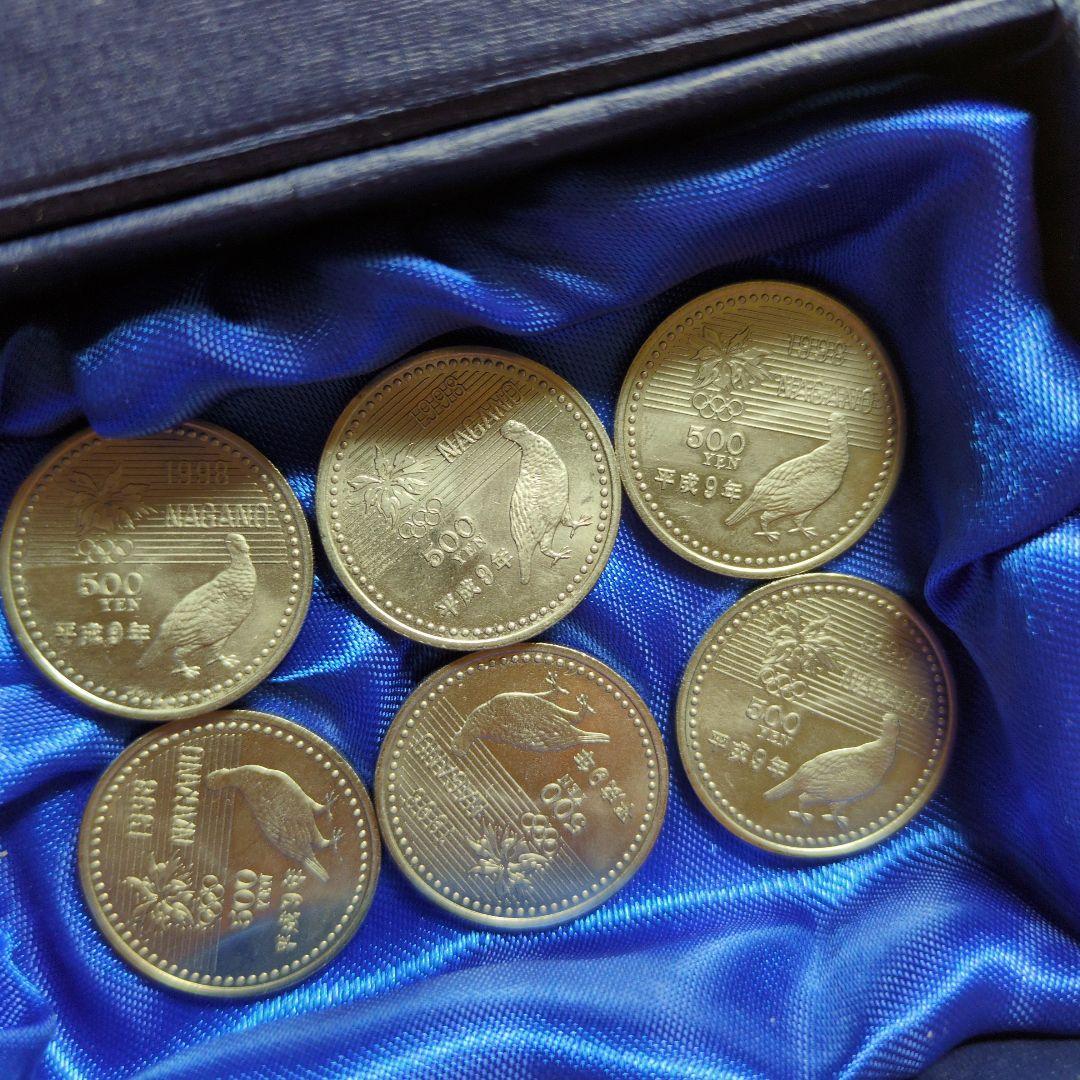 1998年長野オリンピック記念硬貨✖10枚、1975年沖縄海洋博記念硬貨✖4枚