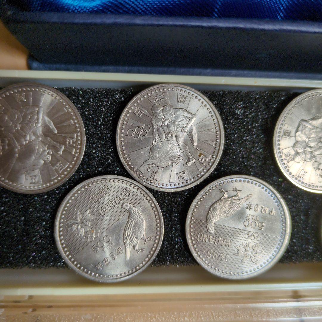 1998年長野オリンピック記念硬貨✖10枚、1975年沖縄海洋博記念硬貨✖4枚