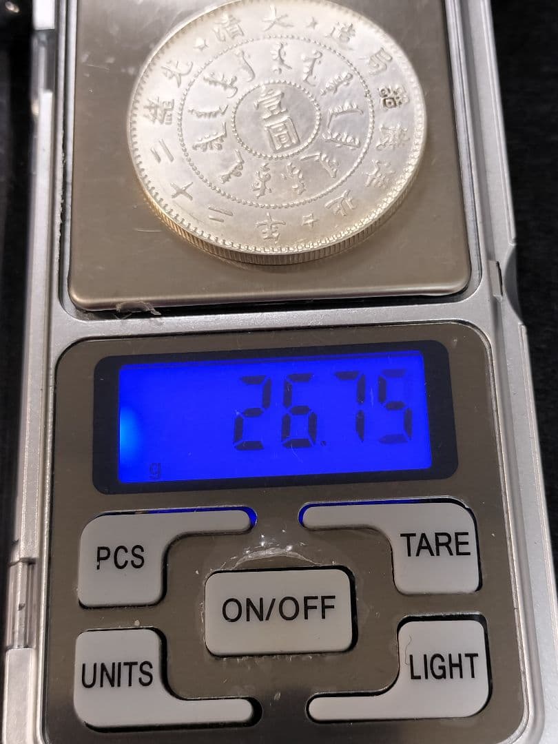 A*9様 銀貨保証中国銀貨メダル 目方約26.7g 銀含有率約90% 中国古銭銀
