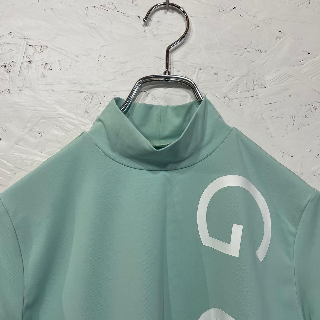 ゴルフウェア　新品タグ付【DESCENTE】ベアスムースモックネック半袖シャツL