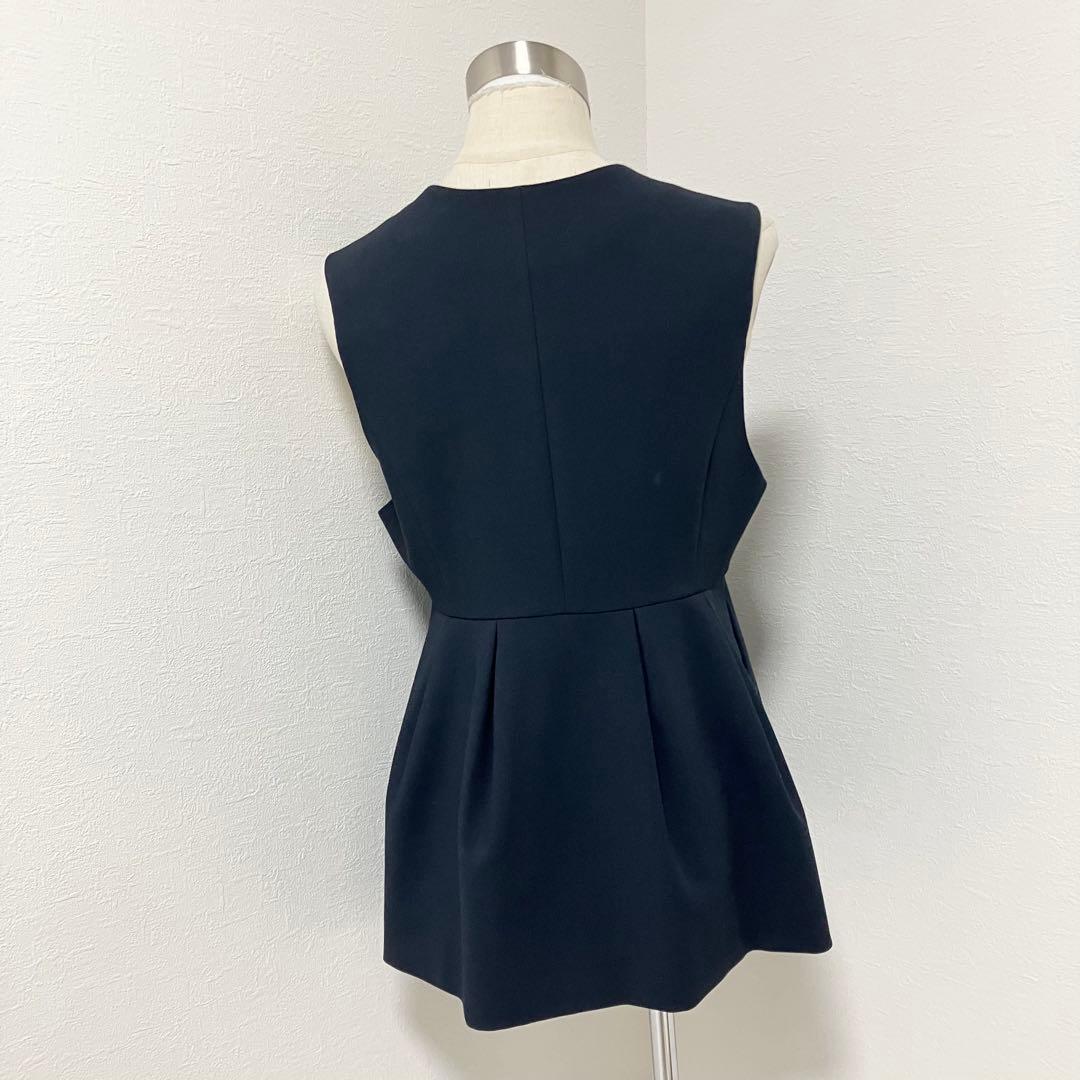 green label relaxing✨ダブルクロス ペプラムジレ