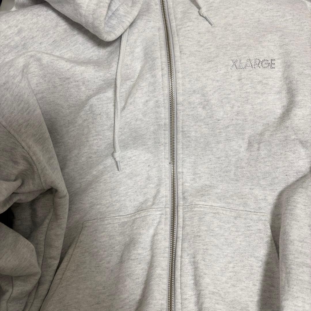 〈値下げ交渉可‼️〉XLARGE フード付きラインストーンパーカー