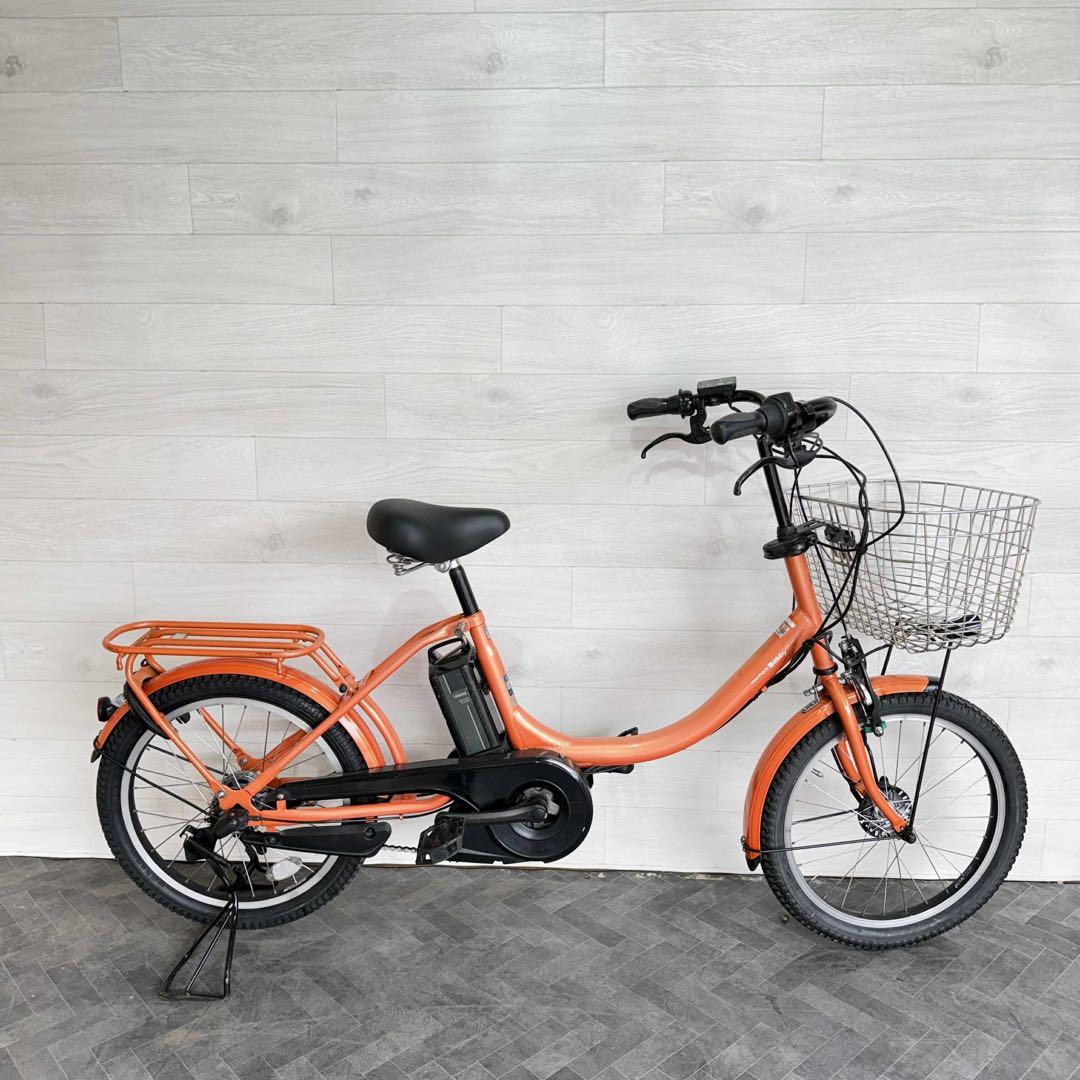 オレンジ 電動アシスト自転車 シティタイプ