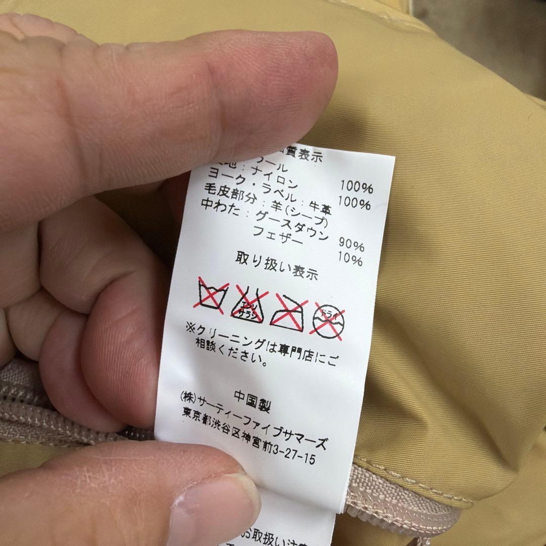t*a様 未使用品タグ付自宅保管ロッキーマウンテン限定ダウンベスト40サイズ