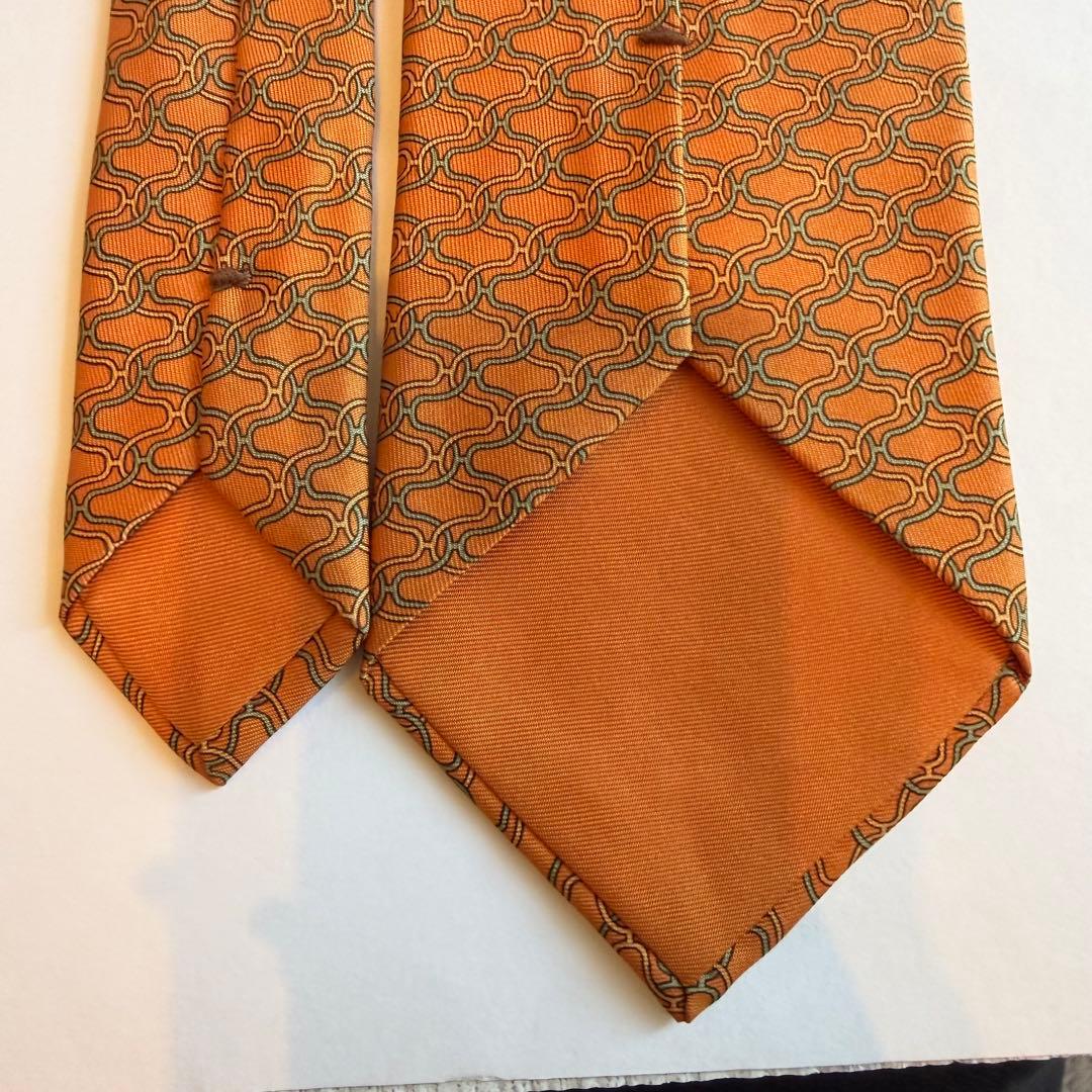 美品　エルメス　HERMESオレンジ 幾何学模様 H柄　高級ブランドネクタイ