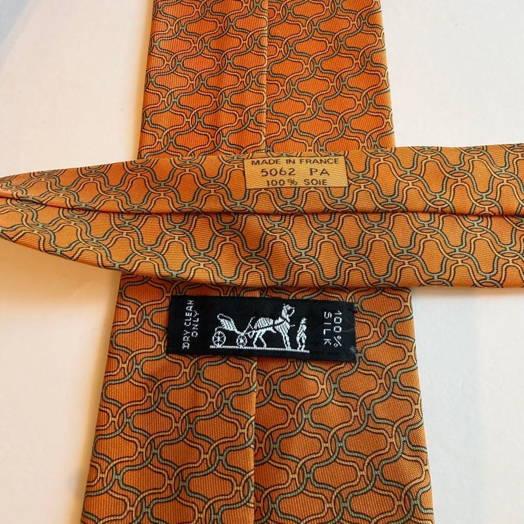 美品　エルメス　HERMESオレンジ 幾何学模様 H柄　高級ブランドネクタイ