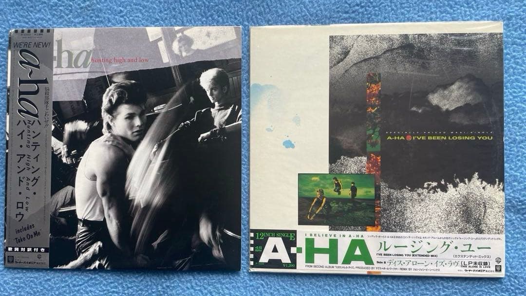 a-ha「ハンティング・ハイ・アンド・ロウ」「ルージング・ユー」レコード2枚。
