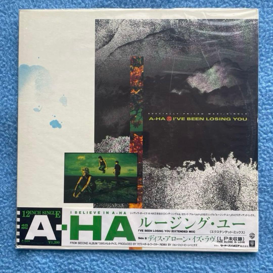 a-ha「ハンティング・ハイ・アンド・ロウ」「ルージング・ユー」レコード2枚。