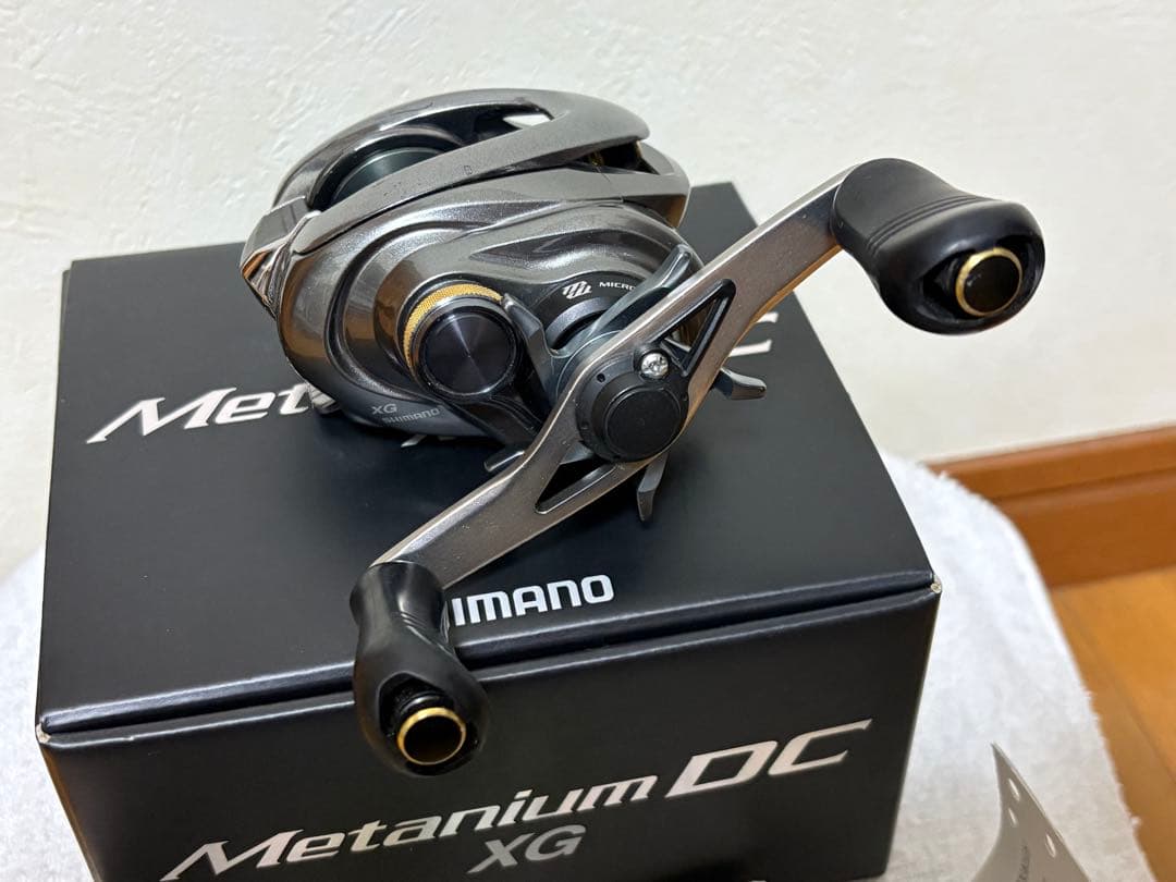 15メタニウムDC XG（右） ※かっ飛びチューニングベアリング内蔵