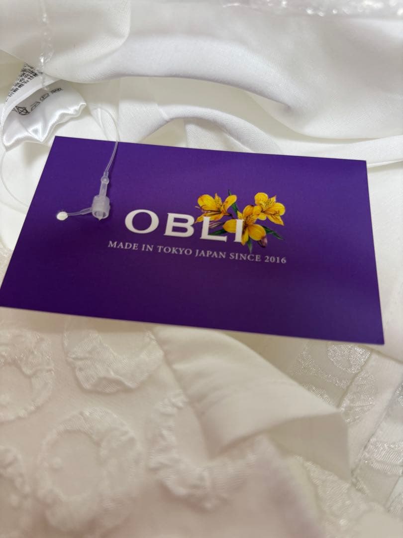 OBLI ジャガードフリルワンピース ホワイト