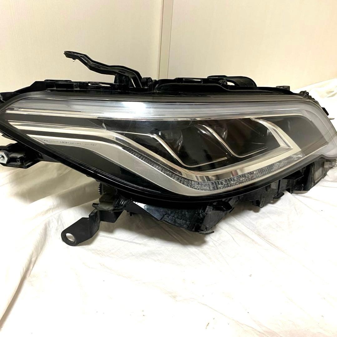 220系クラウン　右ヘッドライト　KOITO30-452 中古