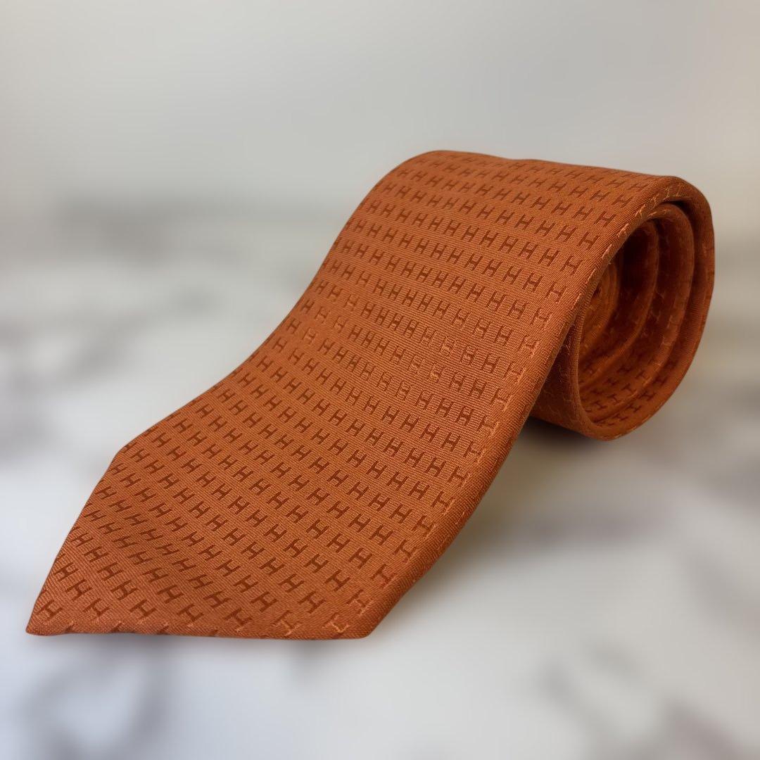 【極美品✨】HERMES ネクタイ　オレンジ　ファソネ　H柄　総柄　刺繍　人気