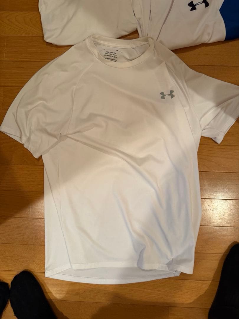 UNDER ARMOUR Tシャツ・ショートパンツセット