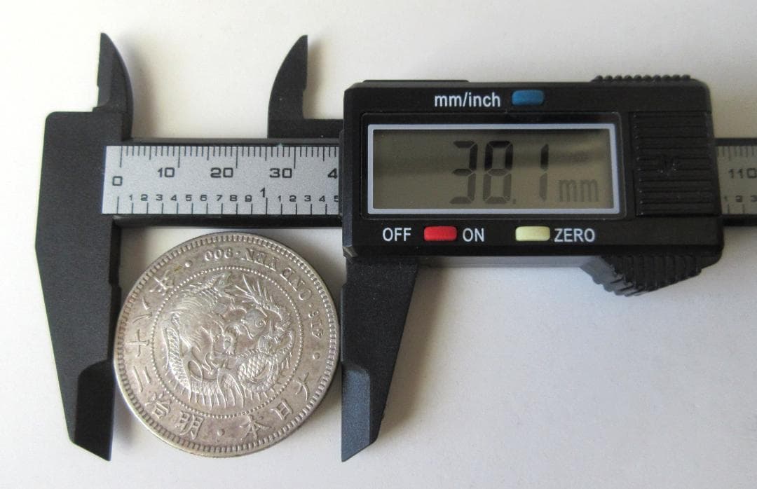 一圓銀貨 丸銀右打 明治28年