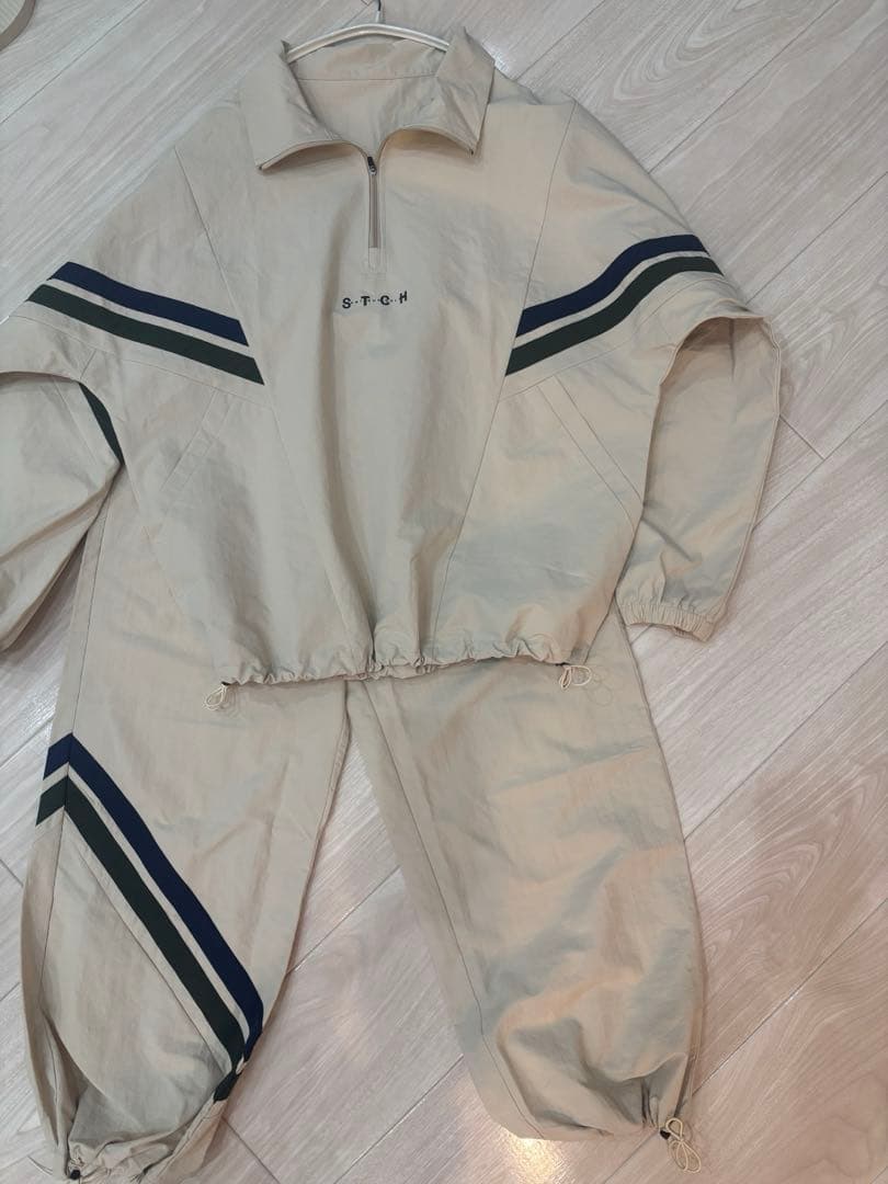 ANTIQUA GOLF×STCH 配色ラインプルオーバー パンツ 上下セット