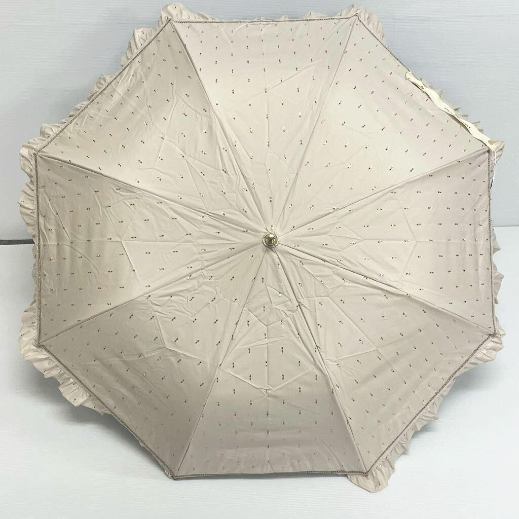 t*o様 新品52994ジルスチュアートベージュフリル晴雨兼用折りたたみ日傘雨傘