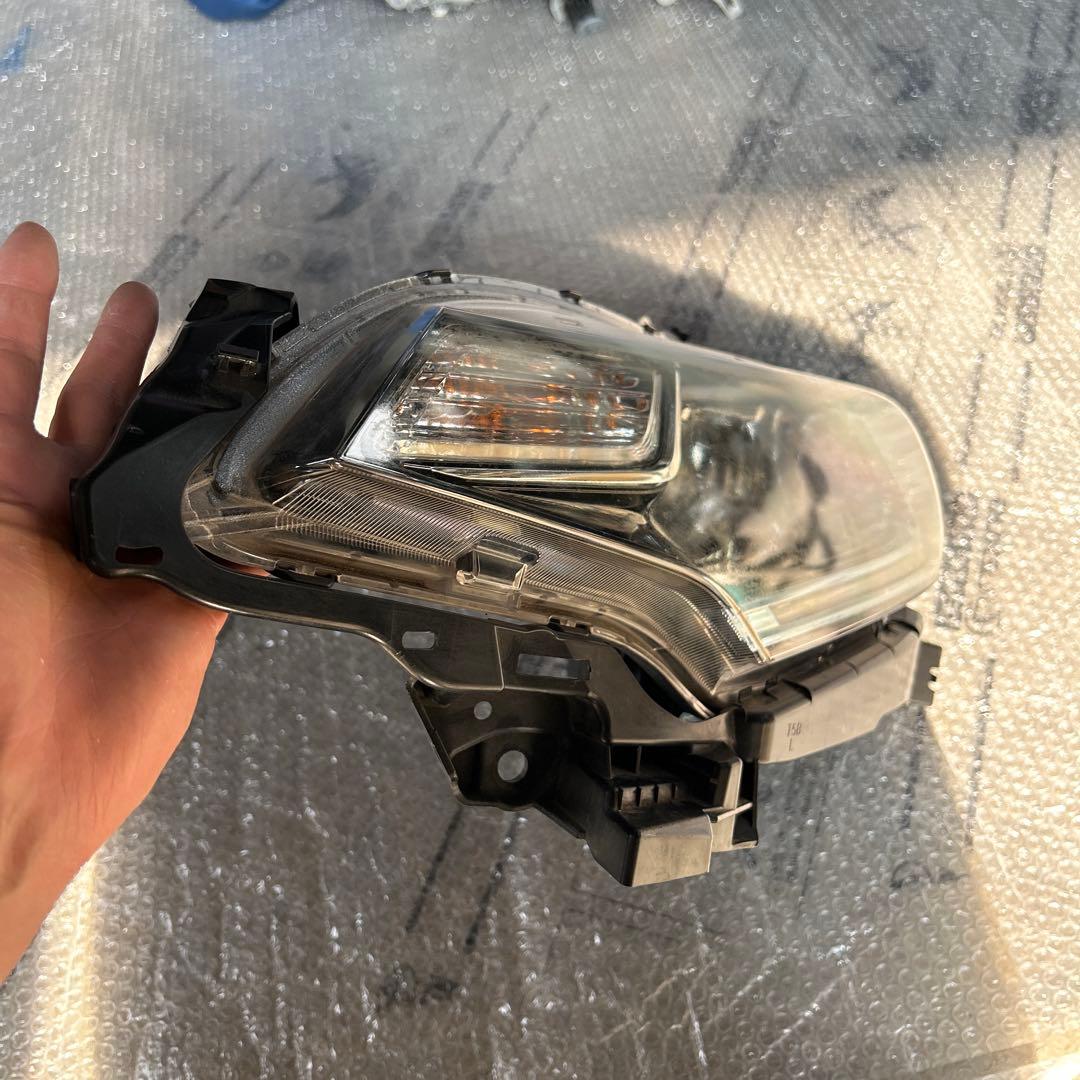 フィット　ヘッドライト　左　STANLEY W3674 ジャンク品