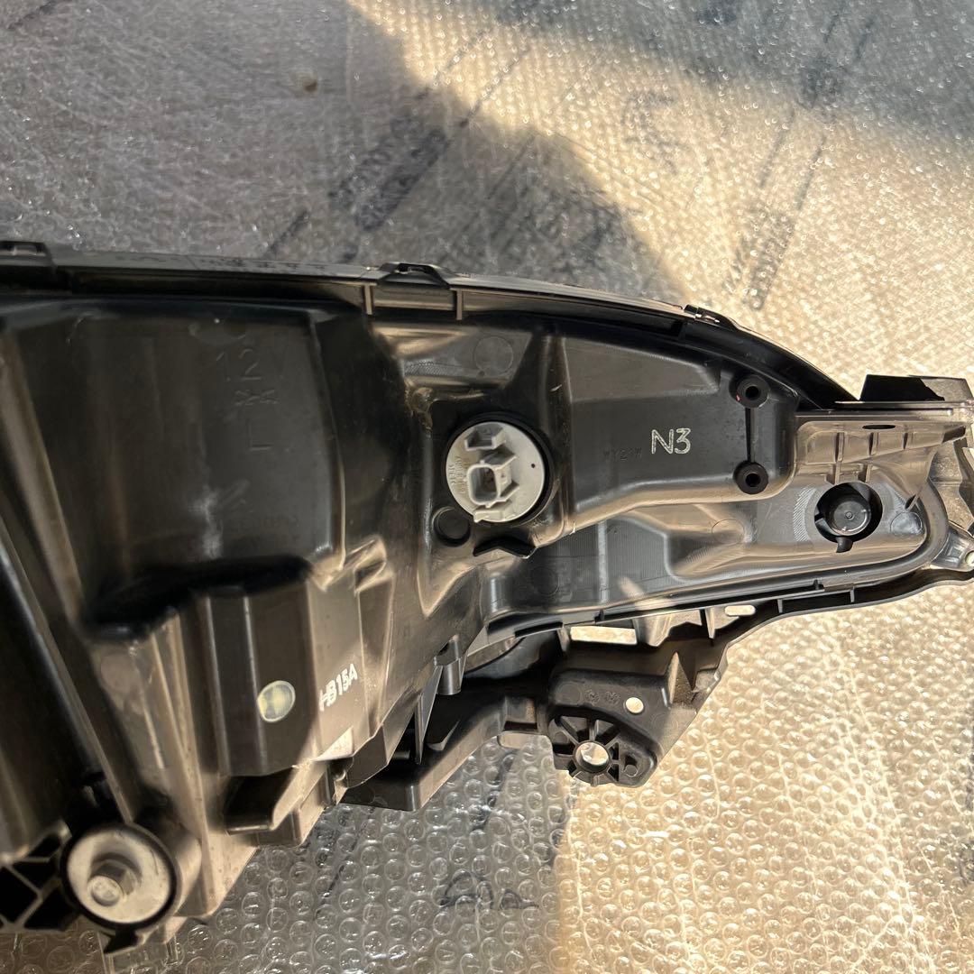 フィット　ヘッドライト　左　STANLEY W3674 ジャンク品