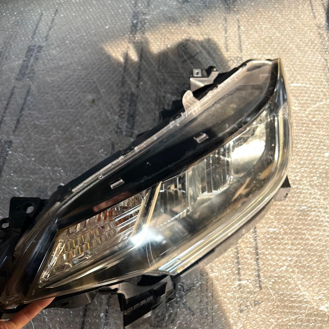 フィット　ヘッドライト　左　STANLEY W3674 ジャンク品