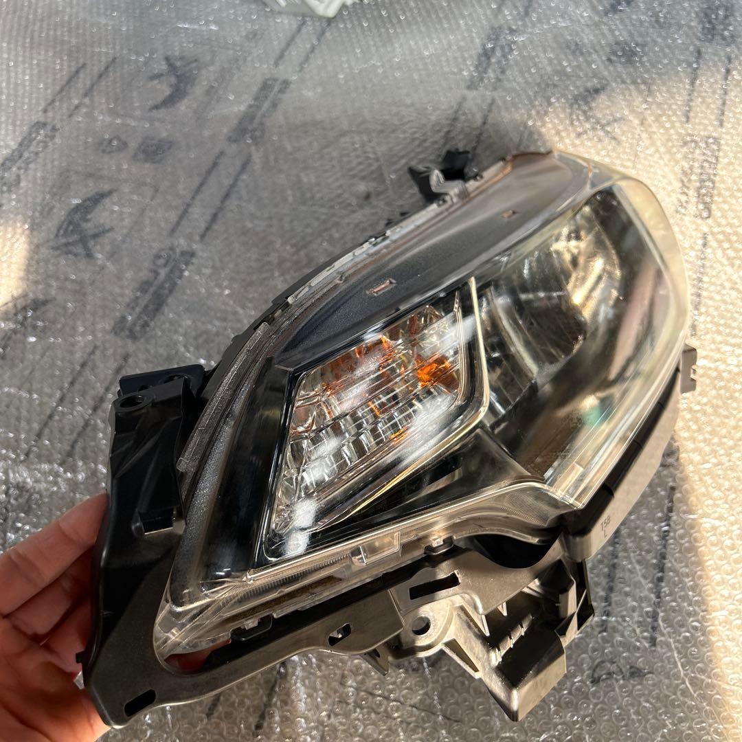 フィット　ヘッドライト　左　STANLEY W3674 ジャンク品