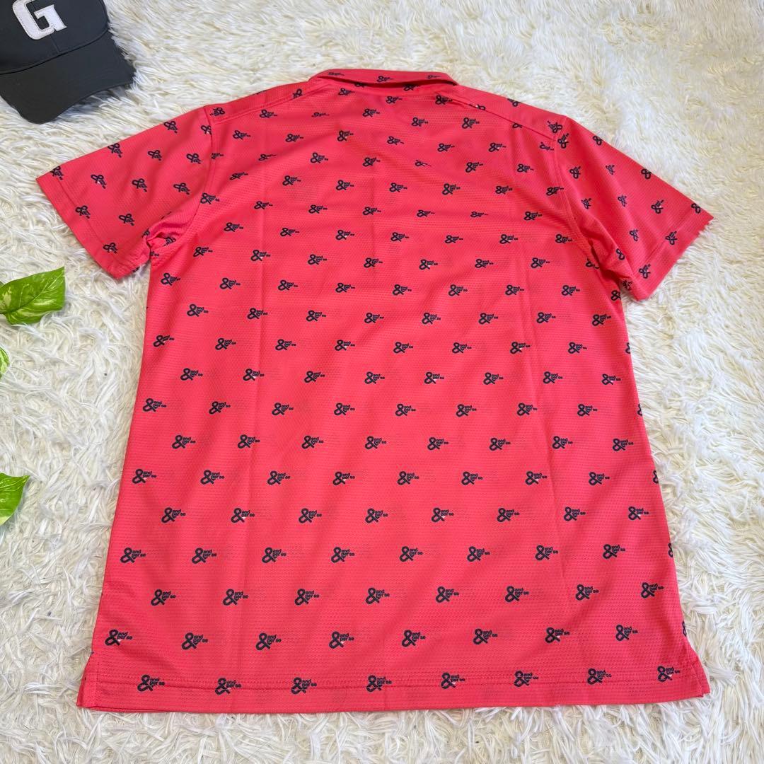 【アンパスィ】極美品 ポロシャツ 総柄 ピンク Lサイズ メンズ 総ロゴ