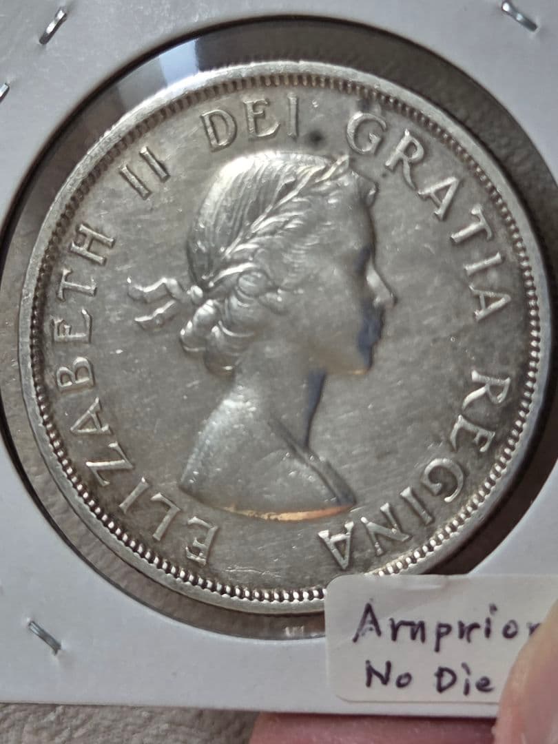 (稀少なバラエティ)　カナダ連邦　エリザベス2世　1 ドル銀貨　1957