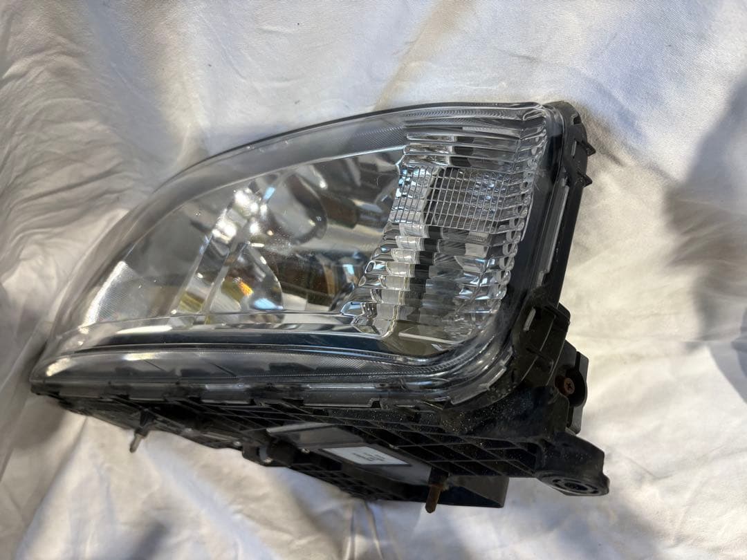 令和2年三菱ふそうヘッドライト左HID MK581269 100-87909