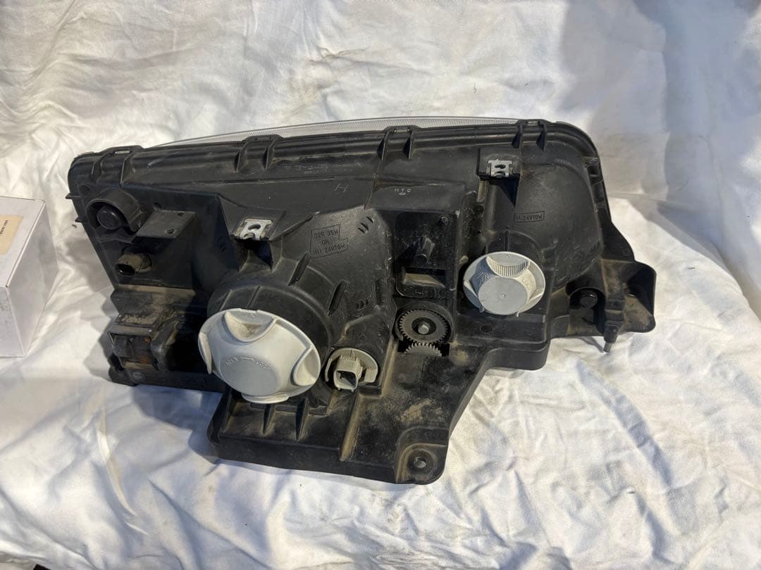 令和2年三菱ふそうヘッドライト左HID MK581269 100-87909