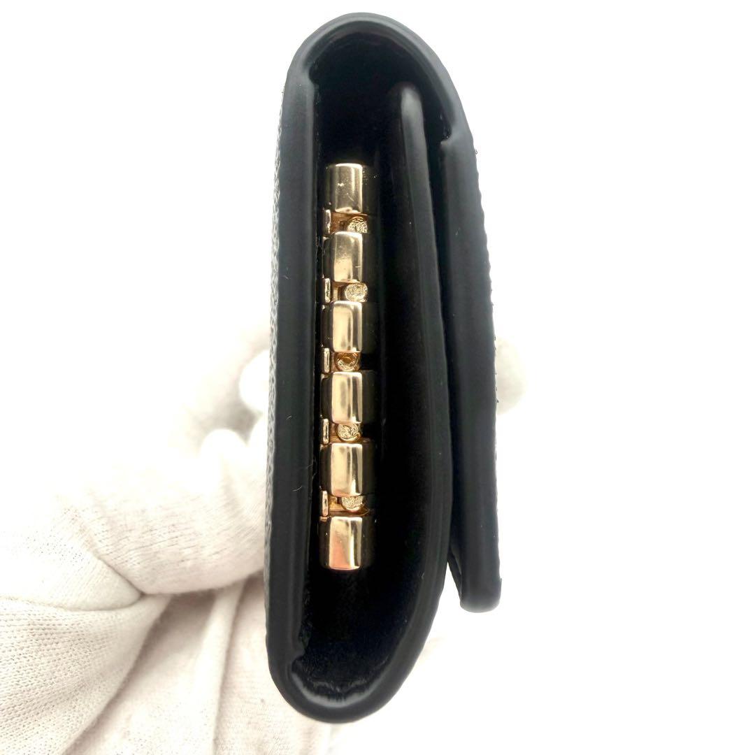 COACH　５連キーケース　ロゴ金具　総柄　馬車ロゴ　型押しロゴ　PVC　レザー