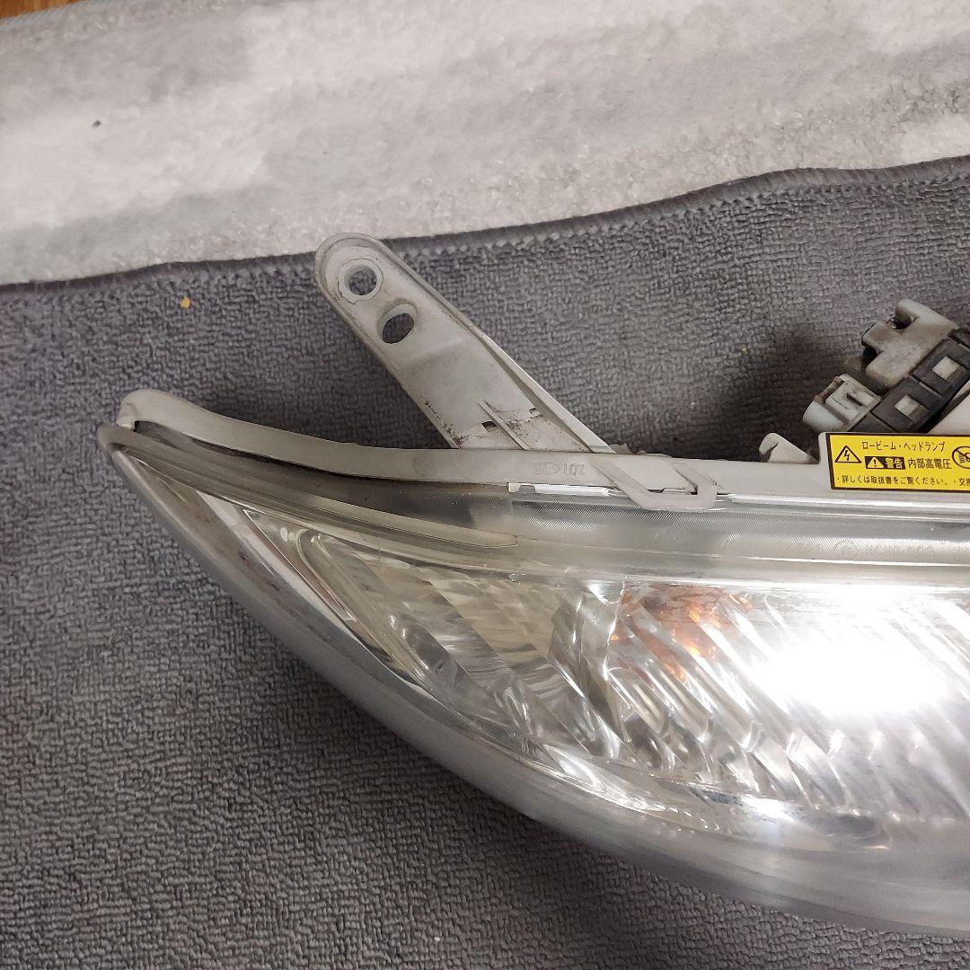 トヨタ 純正 ZNE141G フィルダー HID ヘッドライト 12-526