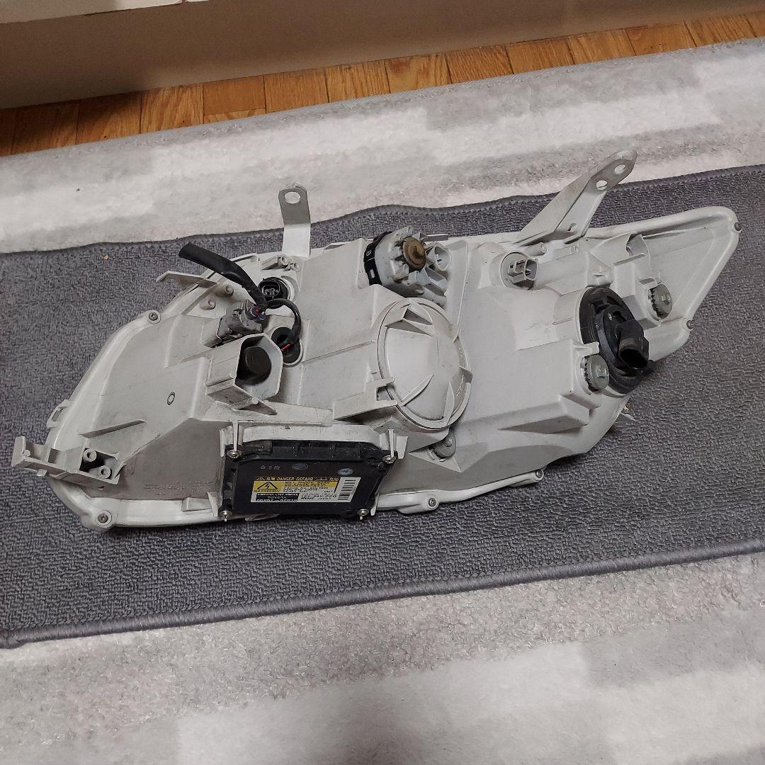 トヨタ 純正 ZNE141G フィルダー HID ヘッドライト 12-526