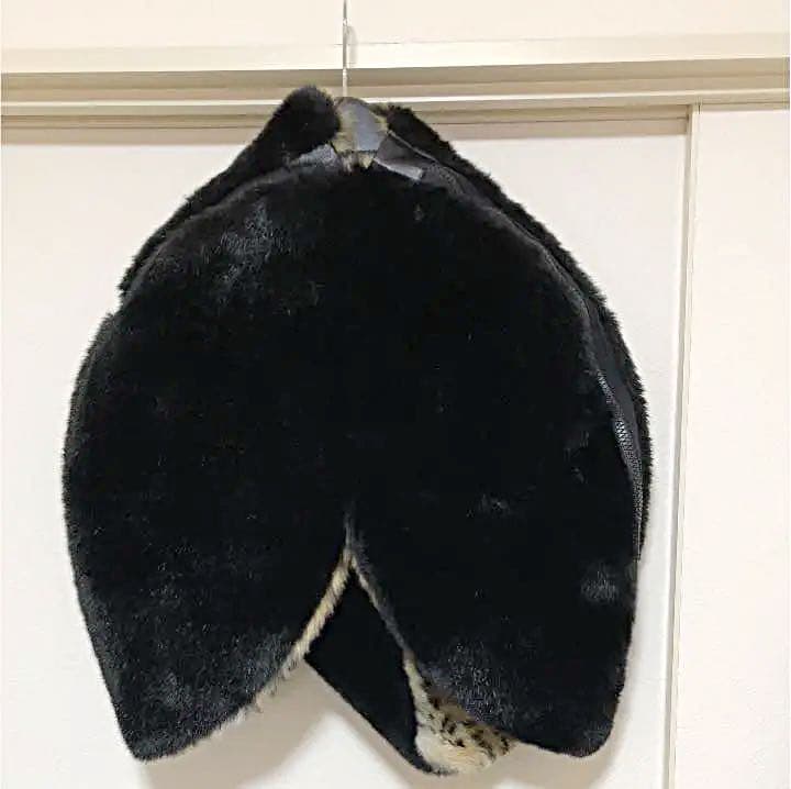 新品コムデギャルソンファーポンチョ