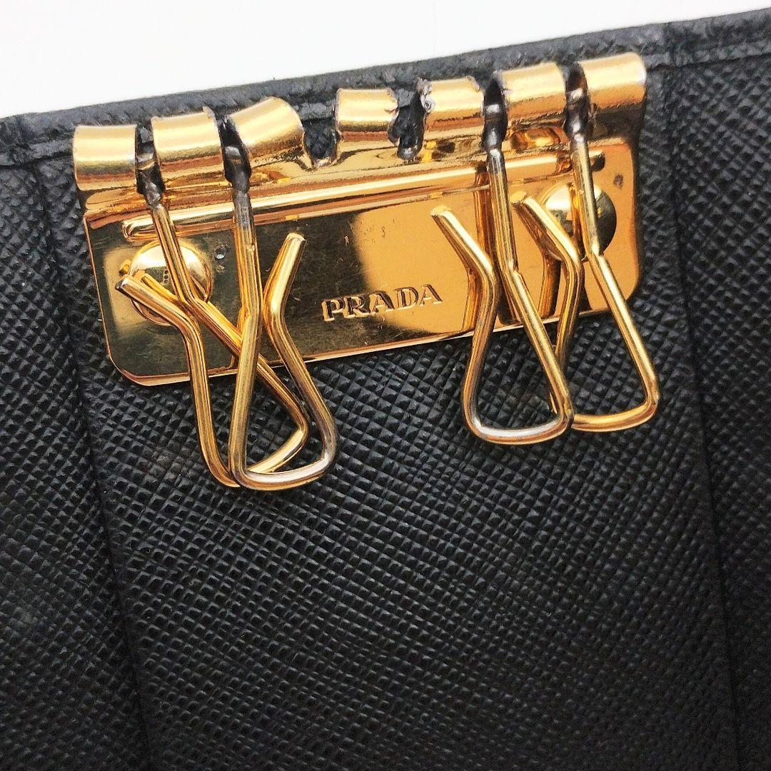 PRADA プラダ キーケース リボン ブラック系×ゴールド 4連 サフィアーノ