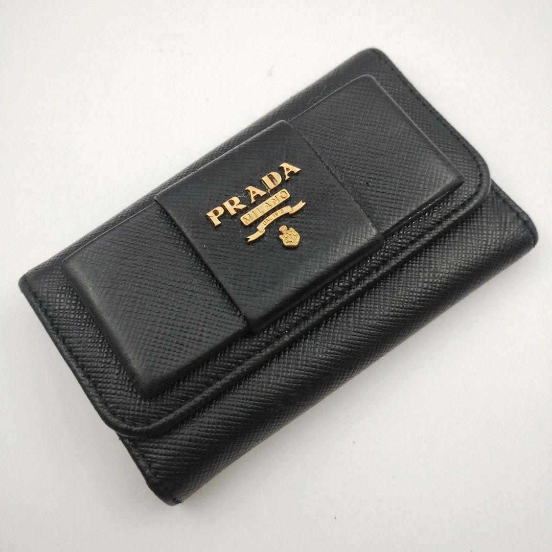 PRADA プラダ キーケース リボン ブラック系×ゴールド 4連 サフィアーノ