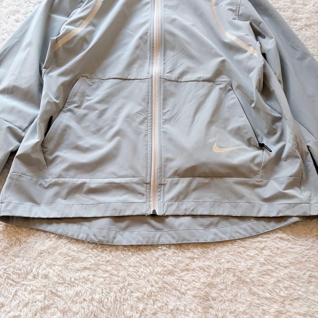 NIKE フード付きライトグレーウィンドブレーカー　XL
