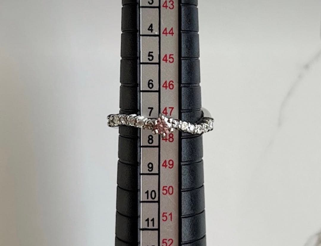 サザエの入れ歯　天然ピンクダイヤ0.103ct.無色ダイヤ0.19ct