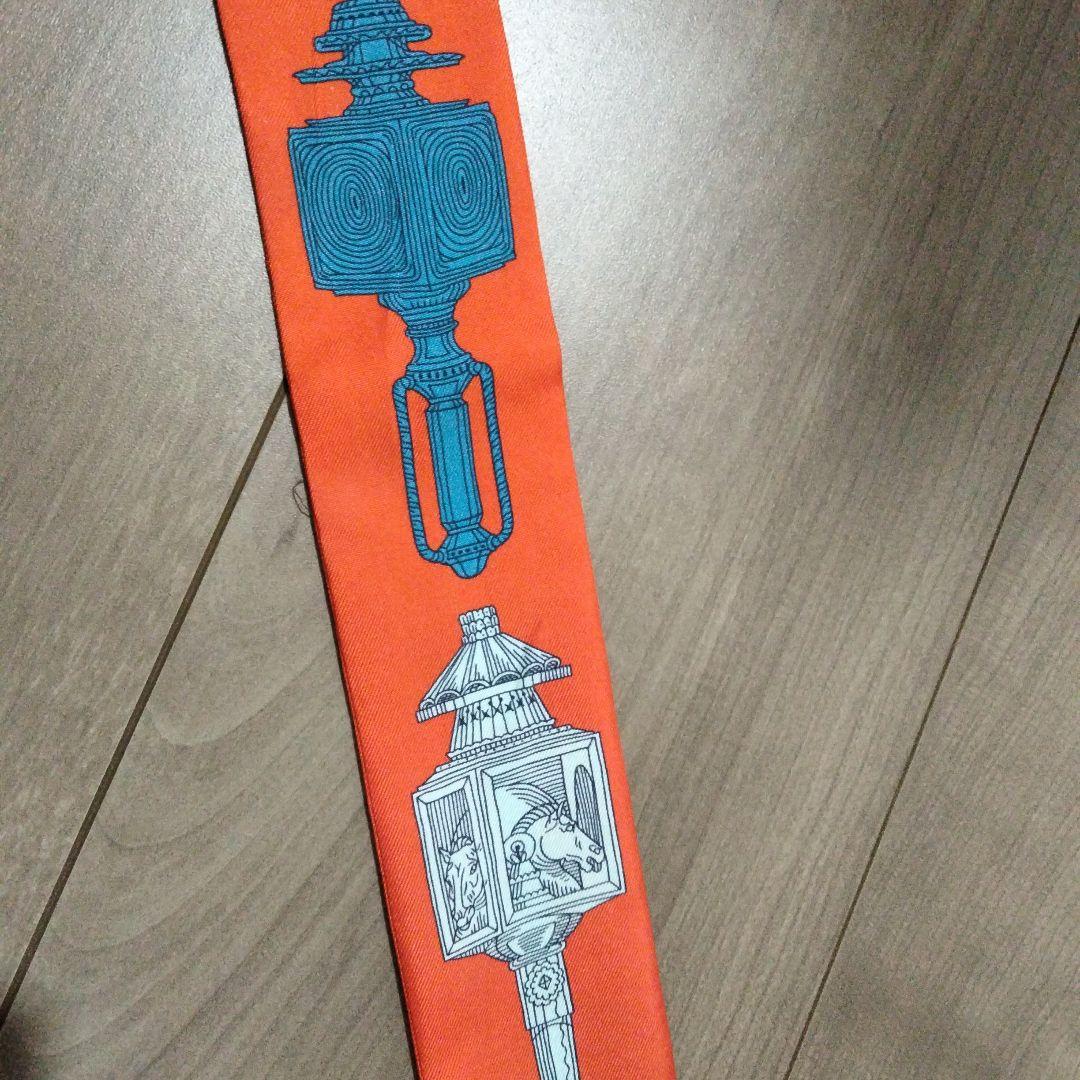 ま HERMES ツイリー オレンジ シルク スカーフ