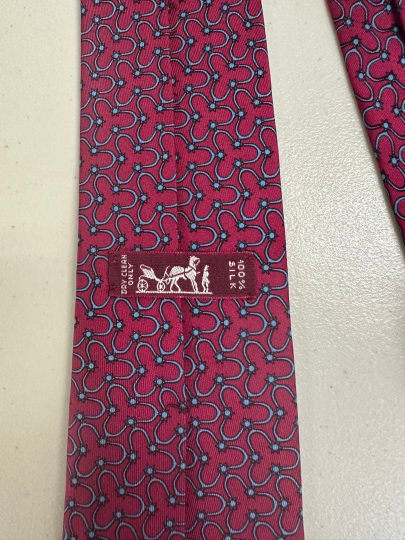 新品　エルメス HERMES ネクタイ 総柄　シルク 赤 レッド　ボルドー